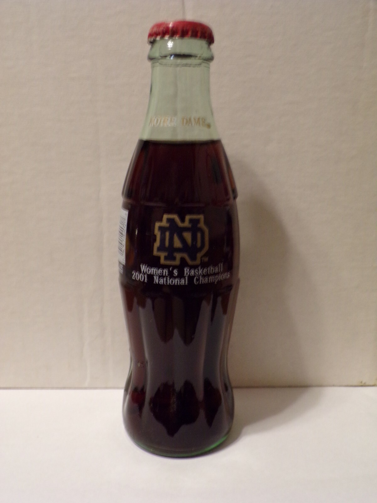 8.0 OZ COCA COLA COMMEMORATIVE BOTTLE - 2001 NOTRE DAME WOME