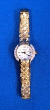 Reloj de vestir vintage de cuarzo para dama Caravelle by Bulova tono dorado