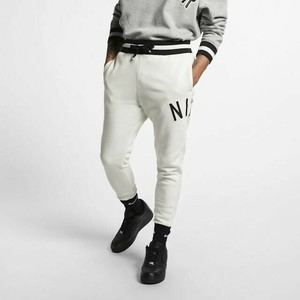 nike pinstripe joggers