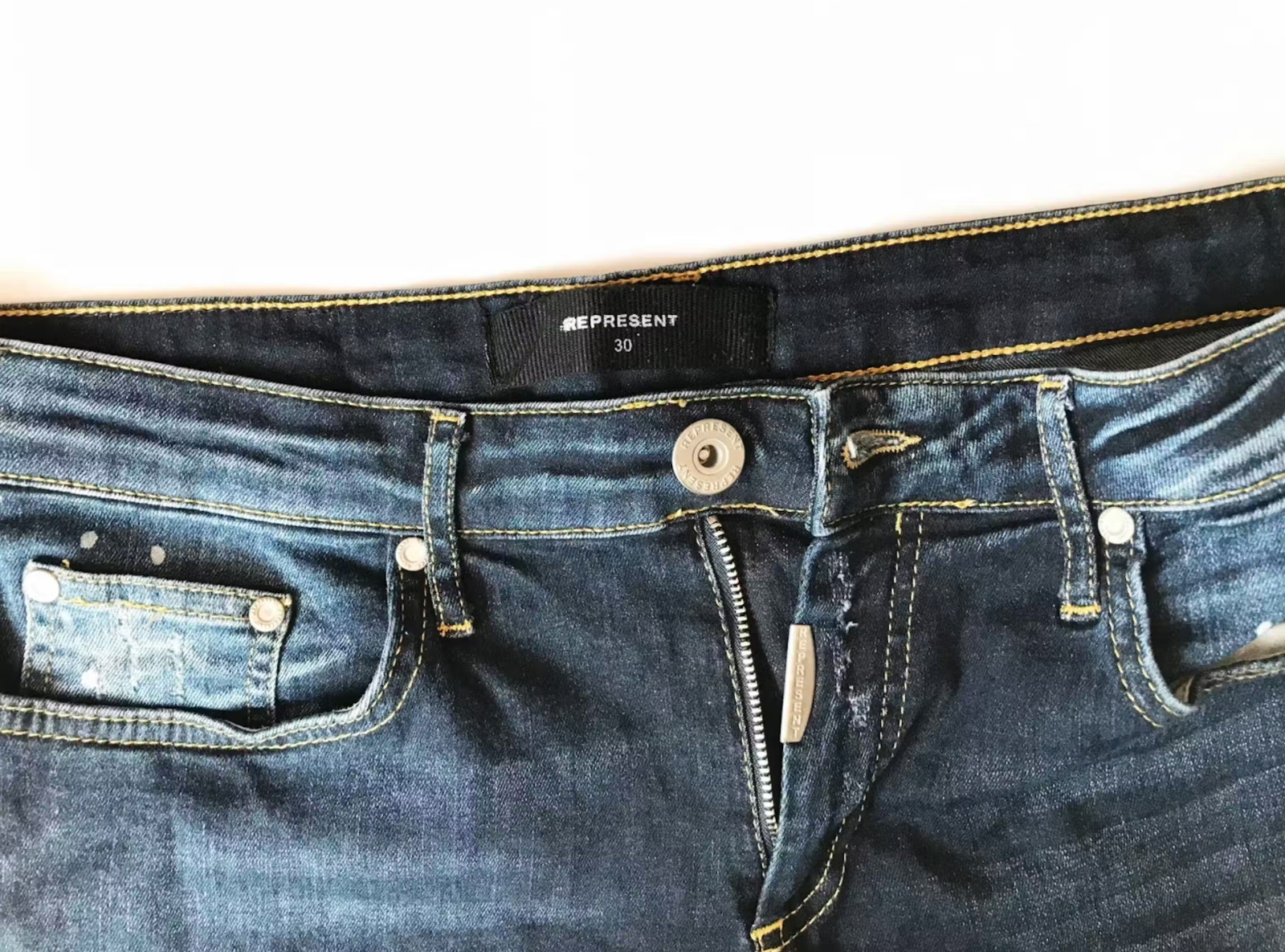 Represent essential distressed/painted skinny jea… - image 4