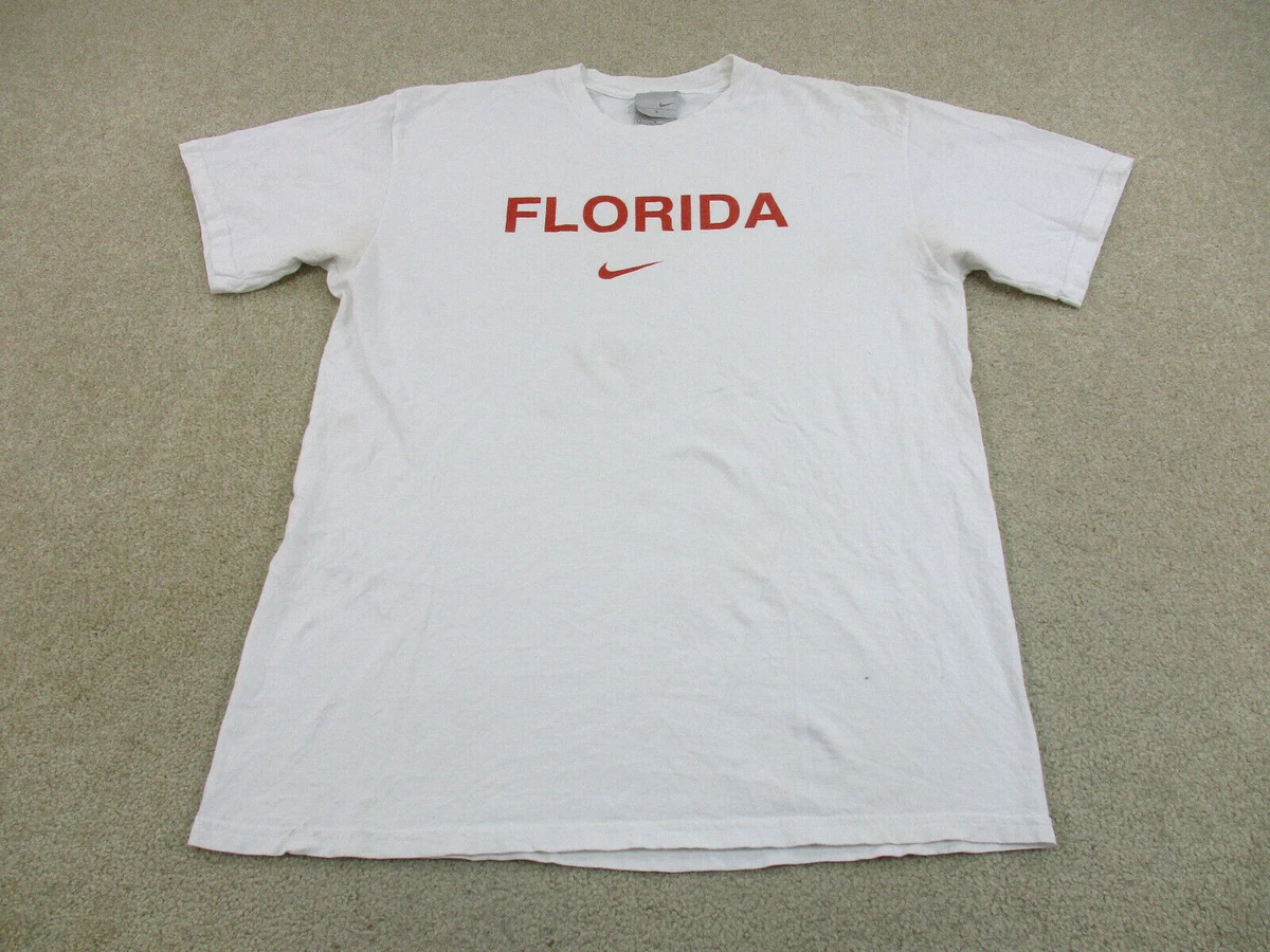 White nike shirt with orange swoosh discount