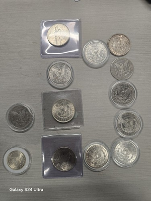 #ad Silver Lot Morgan and Peace Dollars lot 9.528 Troy Oz of Silver $900.00