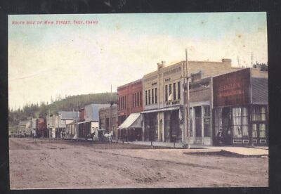 TROY IDAHO DOWNTOWN DIRT STREET SCENE STORES HORSEES POSTCARD COPY