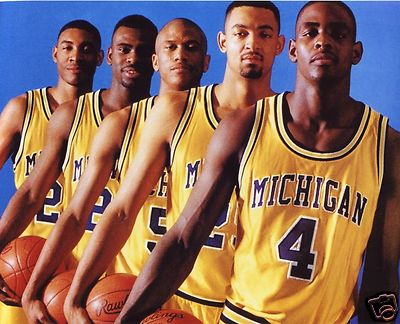 Michigan Wolverines basketball team celebrating victory
