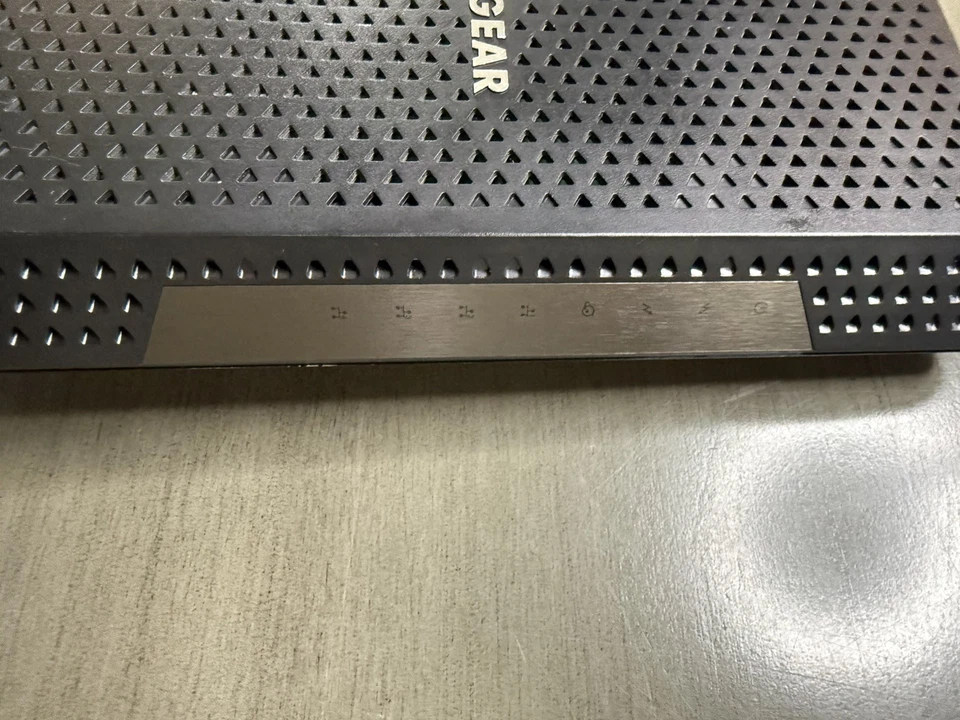 Cable módem NETGEAR Nighthawk CM1200-100NAS DOCSIS 3.1 con cable de alimentación Foto 4 de 4