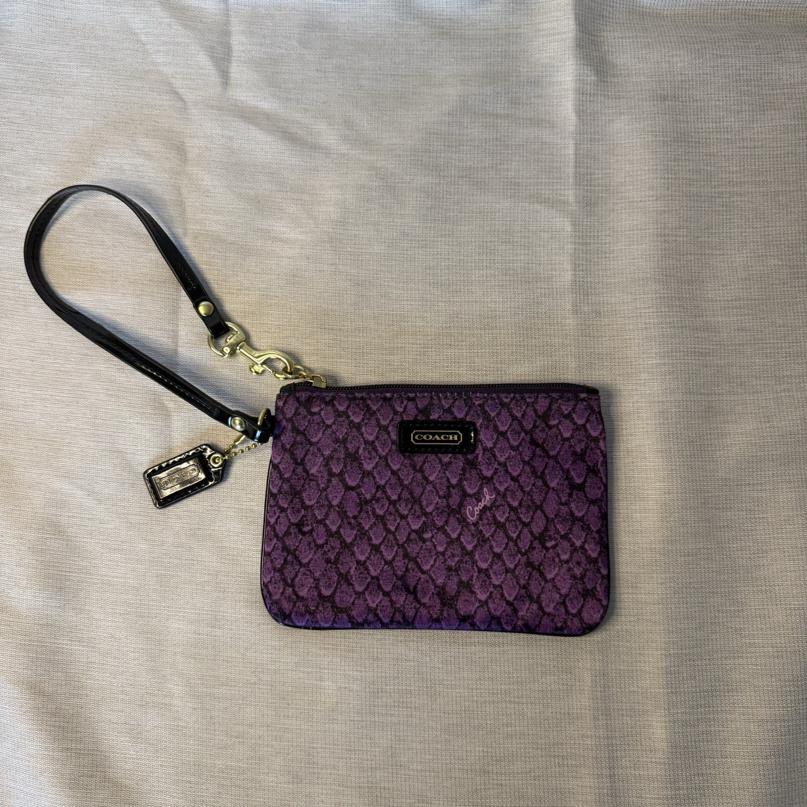 Coach Purple Python Pattern Wristlet – Black Stra… - image 1