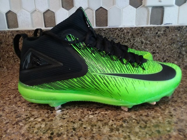 black and green baseball cleats
