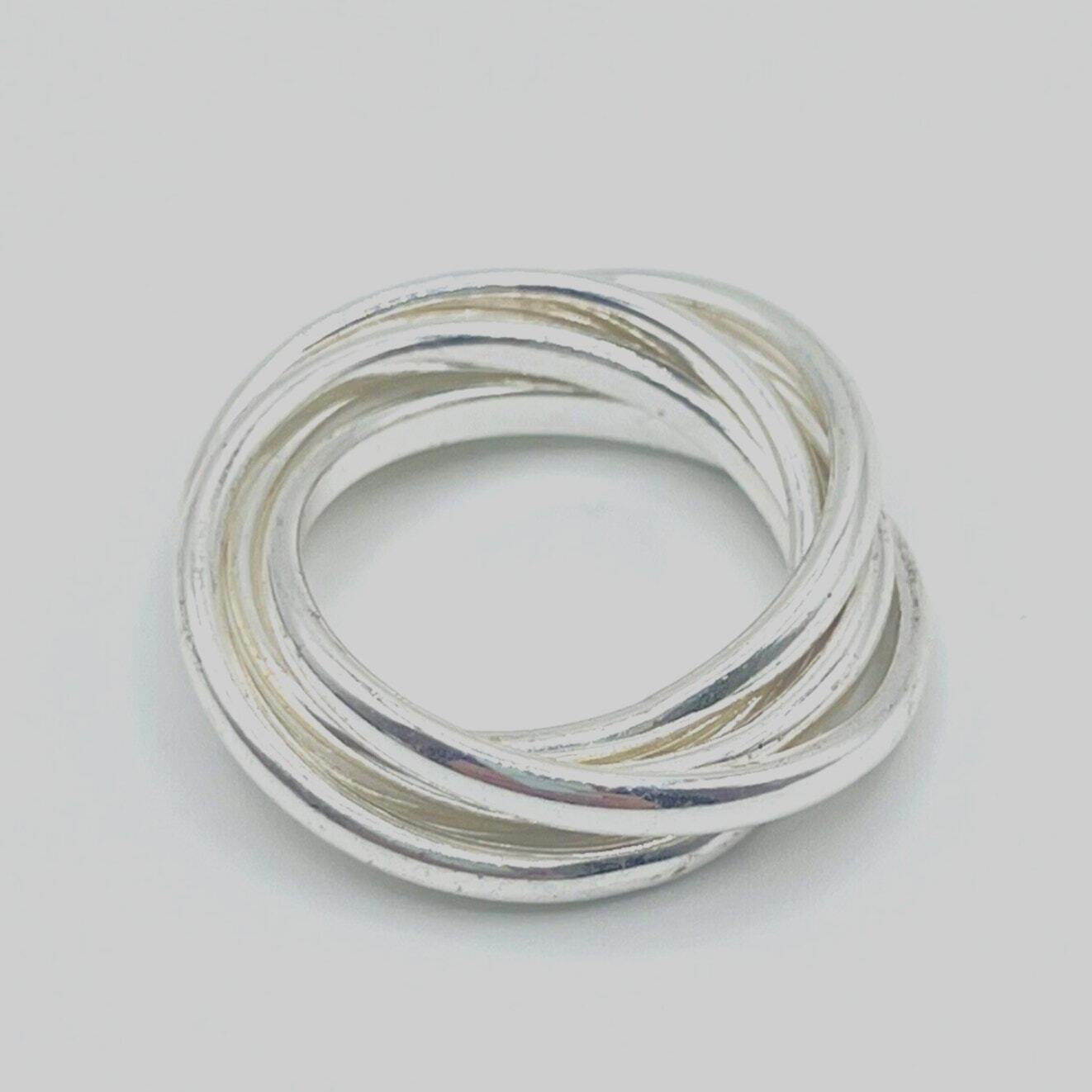 Unique Interlocking Silver Plated Band Rolling Ri… - image 1