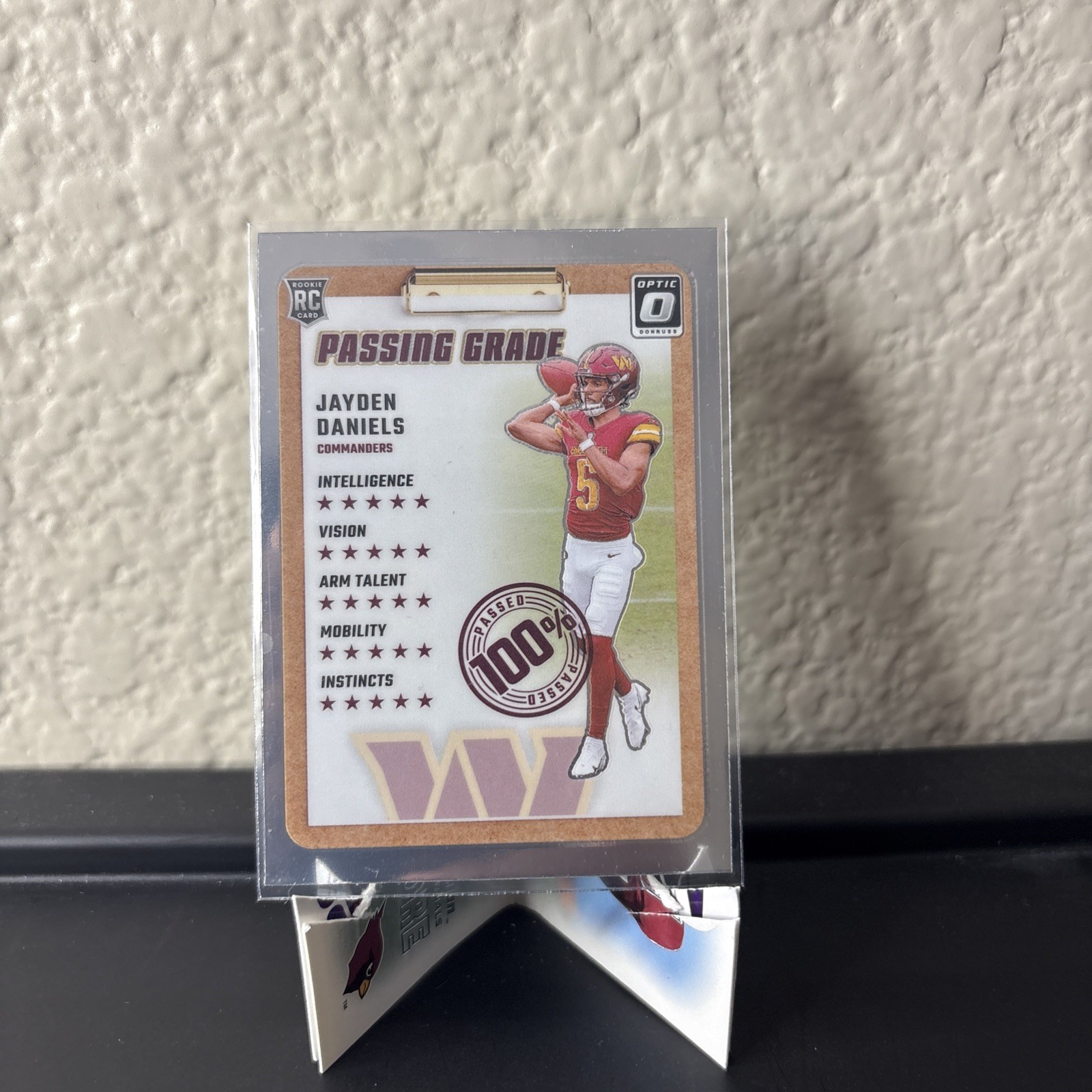 2024 Panini Donruss Optic - Passing Grade Jayden Daniels #2 (RC)