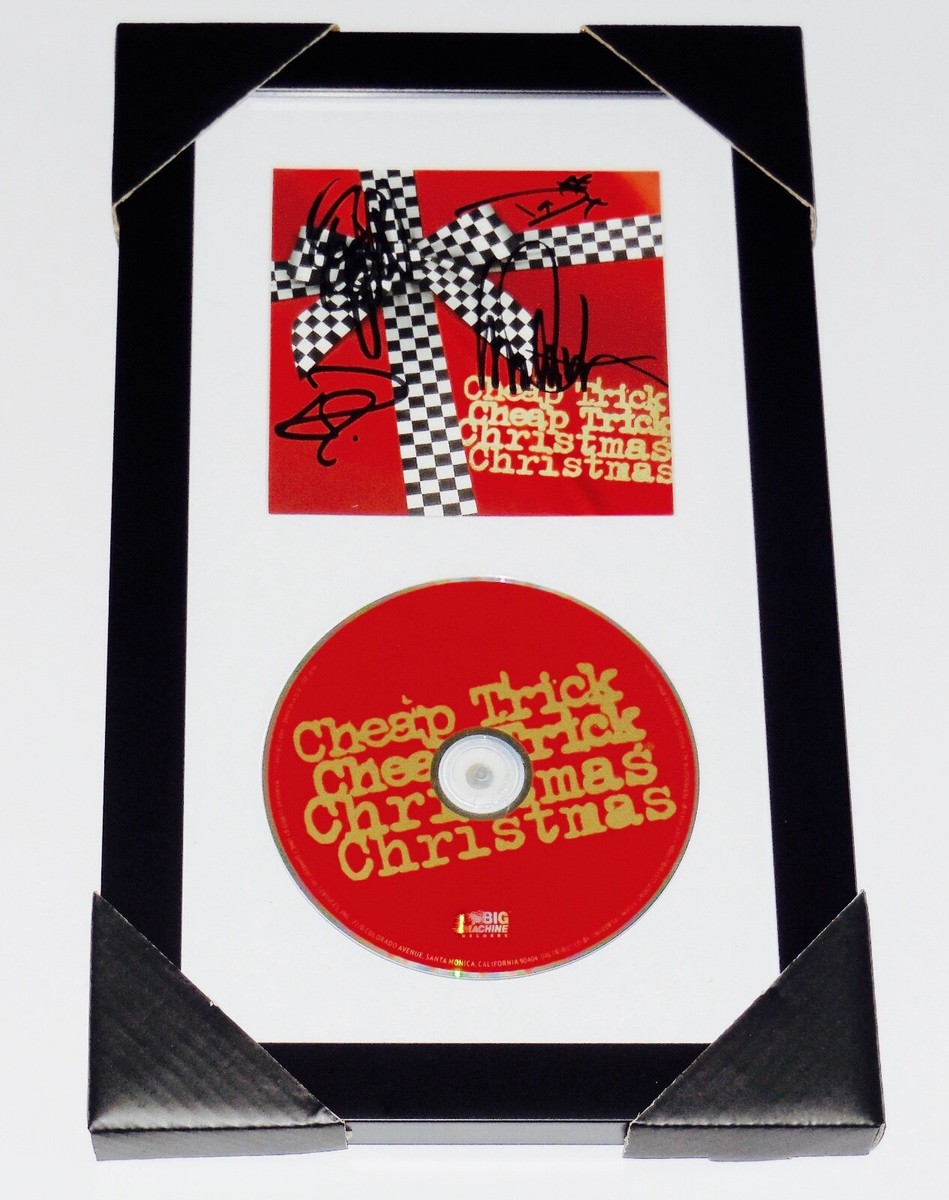 CHEAP TRICK AUTOGRAPHED CHRISTMAS CD COVER (FRAMED & MATTED) - W 