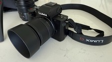 Lumix G100 with: 25mm, 45-150mm, 12-32mm, bag...