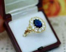 2 Ct Oval Cut Lab Created Blue Sapphire Halo Wedding Ring 14K Yellow Gold Plated