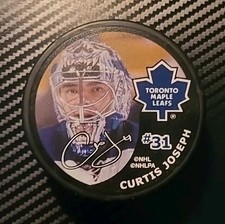 TORONTO MAPLE LEAFS NHL NHLPA PUCK CURTIS JOSEPH STAMPED ON SIGNATURES PUCK 