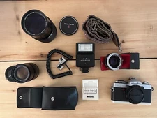 Minolta XG-7 35mm Film Camera Bundle – 2 Lenses, Teleconverter, Flash