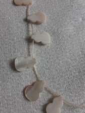 WHITE MOTHER OF PEARL SHAPED 19mmX13.5mm BEADS