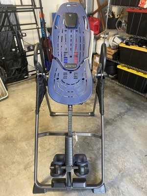 Mesa de inversión (Inversion Table), marca Teeter equipo de ejercicio y terapia.