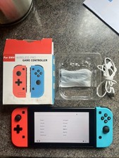Nintendo Switch 32GB Console HAC-001 with Red and Blue Joy Cons and Memory Card