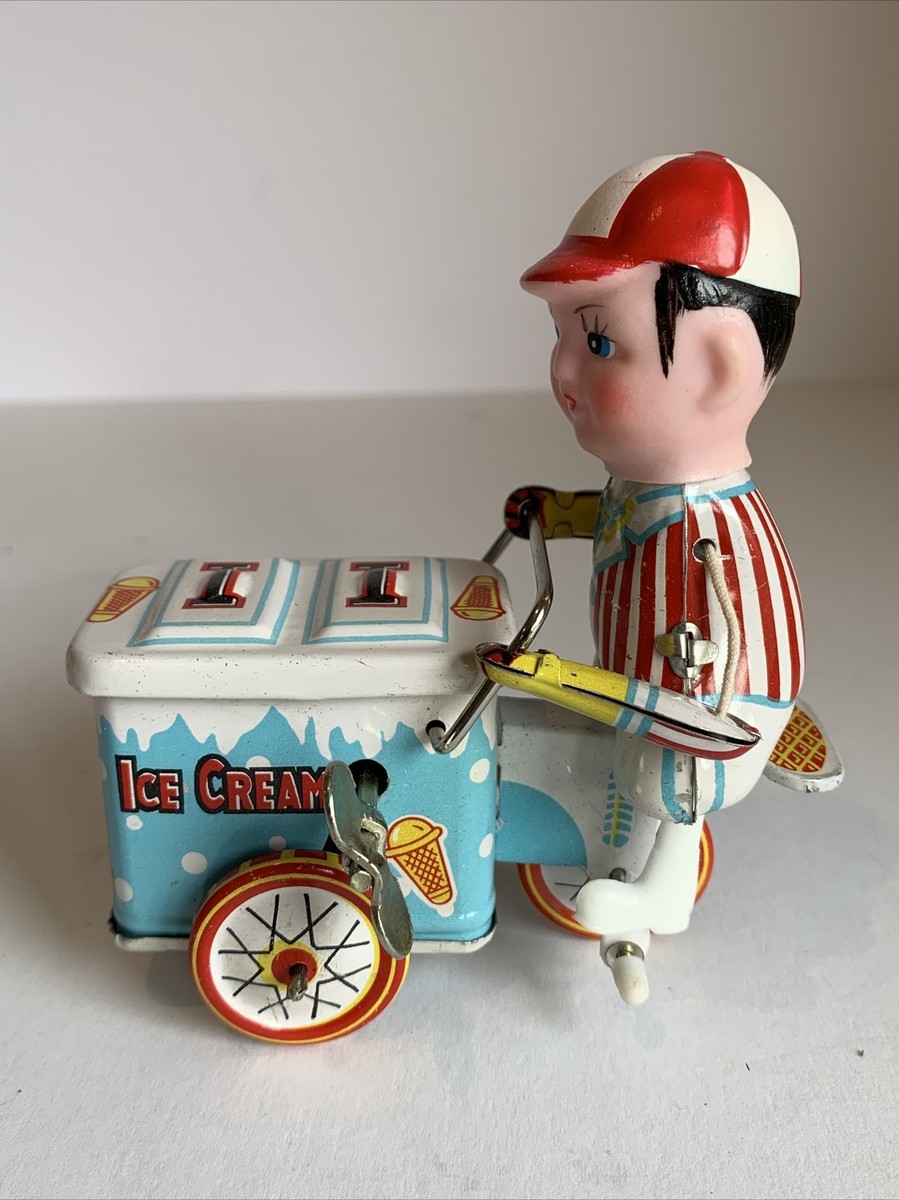 COLLECTIBLE CLOCK WORK ICE CREAM VENDER WIND UP TIN TOY WORKING
