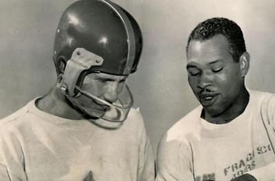 1920 football helmet Antique Leather Football Helmet and Stand c.1900