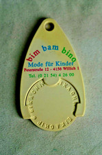 Einkaufswagenchip mit Halter: bim bam bino, Mode f&uuml;r Kinder, aus Plastik.