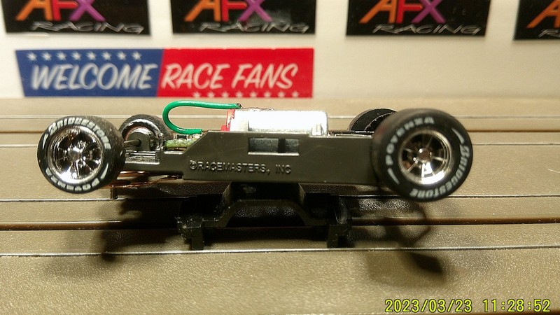 AFX RACING H.O. SCALE MEGA G+ 1.7 NARROW CHASSIS CHROME 5 SPOKE RIM RED CAM LETS