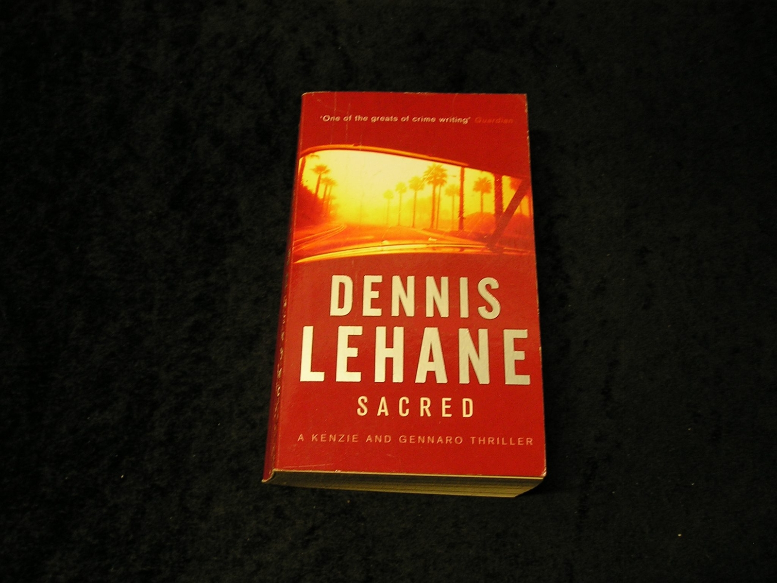 Sacred by Dennis Lehane