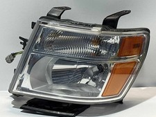 Used Left Headlight Assembly fits: 2014 Nissan Nv 1500 halogen L. Left Grade A