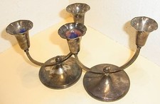 Zwei versilberte Kerzenhalter,Markierung:"W".ca.H 16cm,L 17cm, Dm 10cm, zus.435g