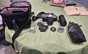 Vintage PRAKTICA SUPER TL1000 35mm film SLR camera with Pentacon 1.8/50 lens