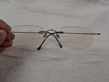 Titan Silhouette Glasses Rimless 7395406056150 w Case F