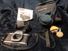 Pentax K 1000 manual 35mm SLR film camera with 50mm lens and 70-210mm macro lens