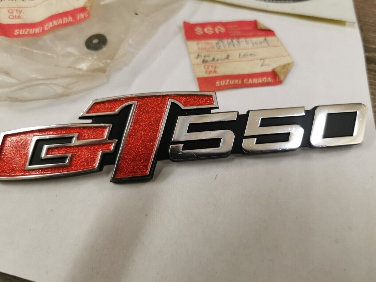 NOS SUZUKI GT550 1972 - 1977 FRAME COVER DECAL 68141-34000 NUT