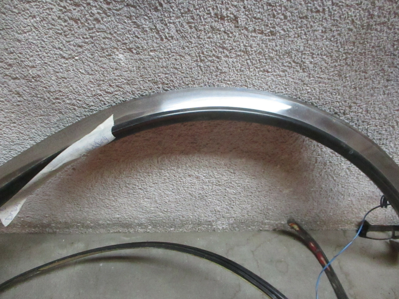 DRIVER  FRONT  WHEEL WELL MOULDING CHRYSLER MASERATI TC 89 90 91 