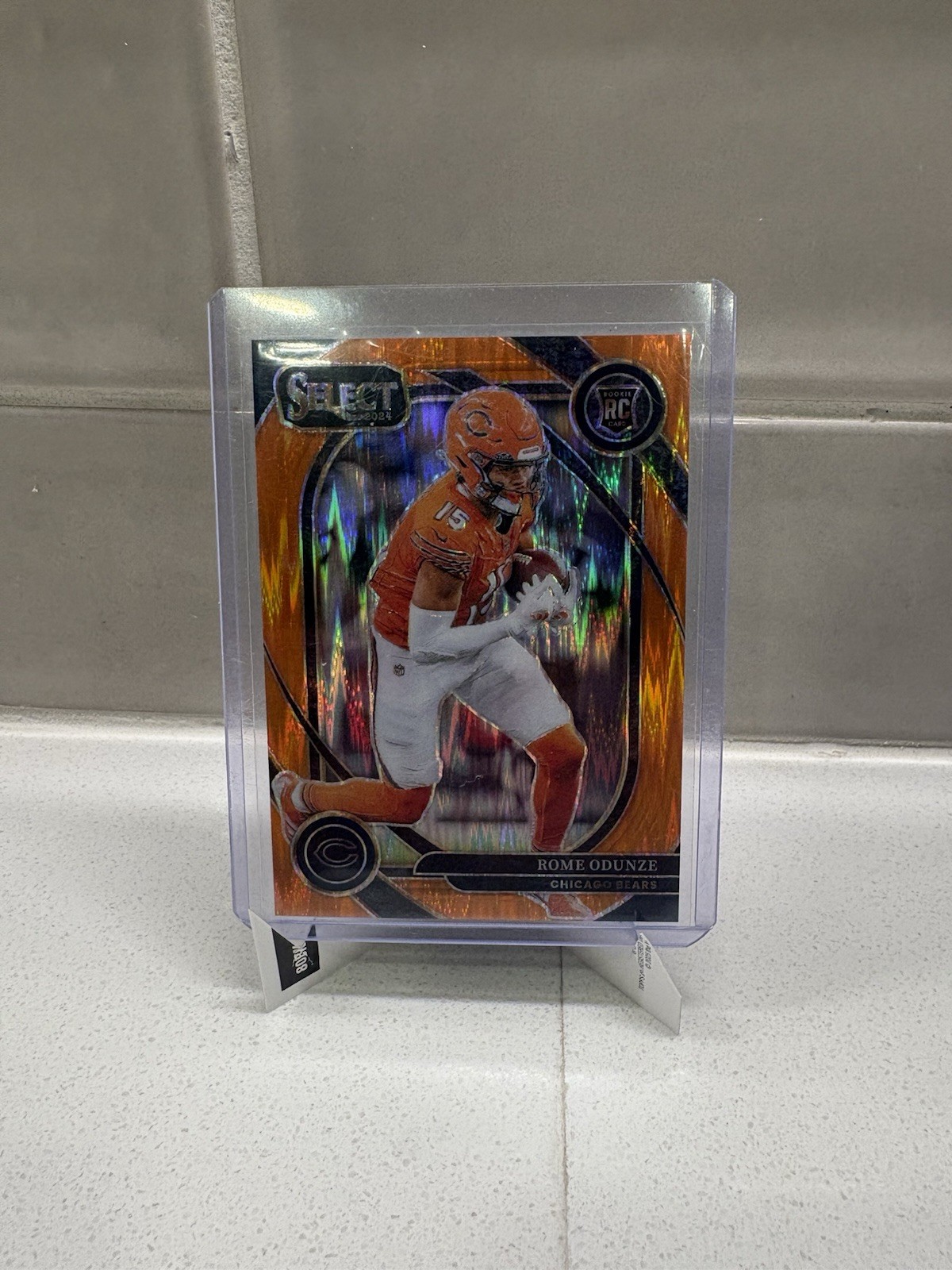 2024 Panini Select Club Level Rome Odunze #236 Orange Shock Prizm /399 (RC)