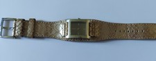 Genuine DKNY ladies watch silver tone face with gold tone leather DKNY strap