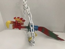 Green red blue yellow Polly Parrot on white perch hanging metal art sculptures