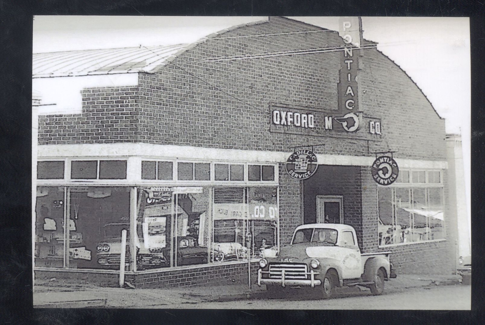 REAL PHOTO AMERICUS OXFORD PONTIAC CAR DEALER ADVERTISING