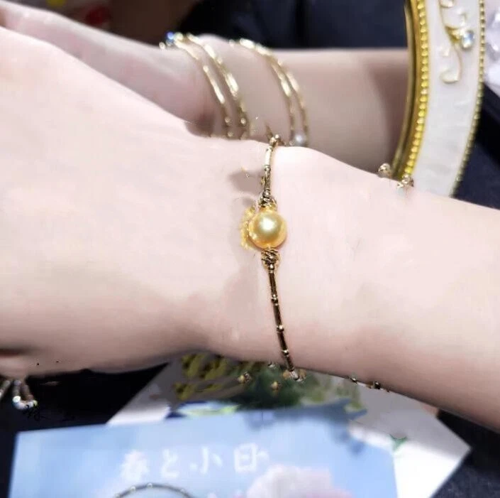 Impresionante AAA 8-9mm Natural Mar del Sur Oro Redondo Perla Pulsera Oro 18k Foto 2 de 4