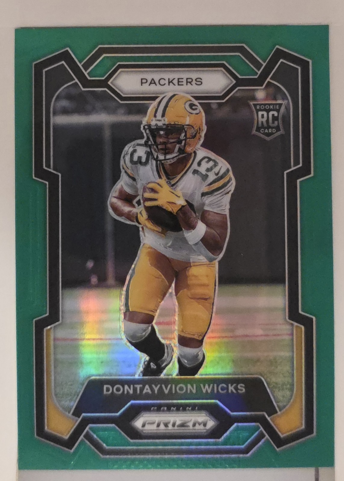 2023 Panini Prizm Football Dontayvion Wicks #333 Green Prizm (RC)