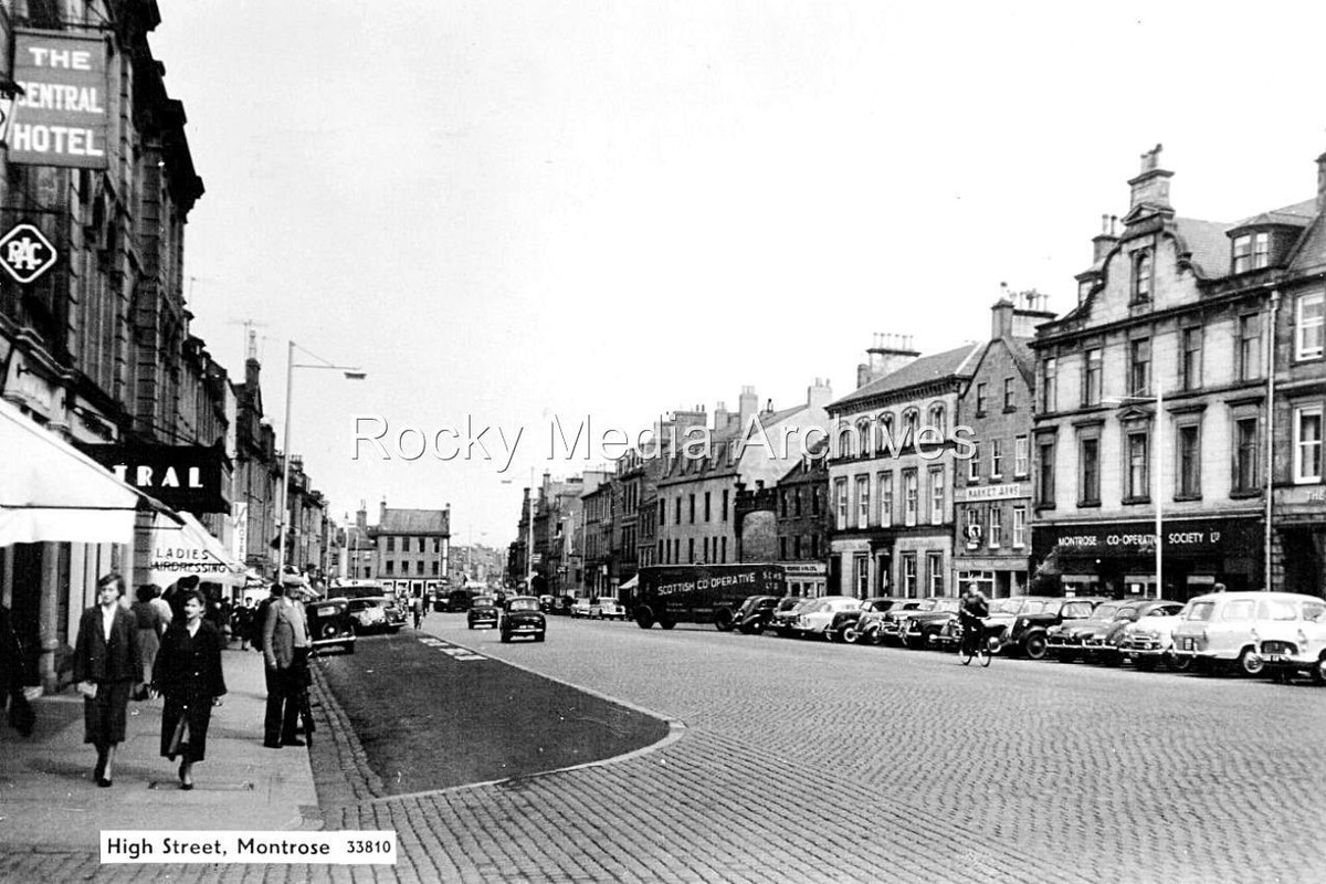 A view looking down the centre of Montrose High Street in Scotland Stock Photo