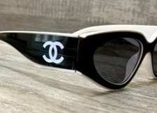 CHANEL Women s Cat Eye Sunglasses Black Plastic Frame Gray Tinted Lenses Logo