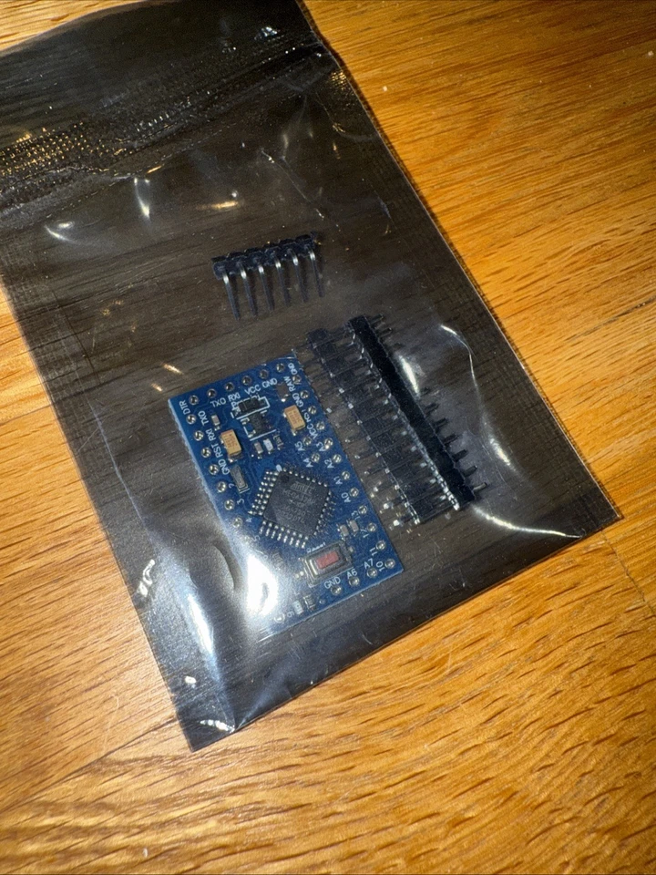 Placa de desarrollo Pro Mini ATmega328P 5V 16MHz para Arduino con cabezales Pin Foto 3 de 4