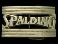 TI09101 VINTAGE 1978 **SPALDING** ADVERTISEMENT SOLID BRASS BARON BELT BUCKLE