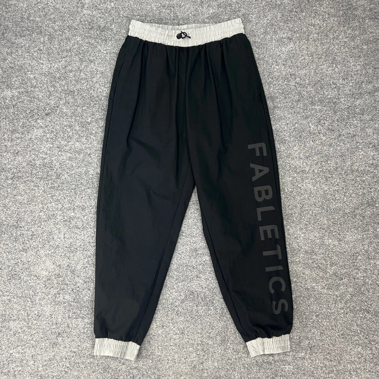 fabletics multi stretch woven kora track bungee drawcord pants