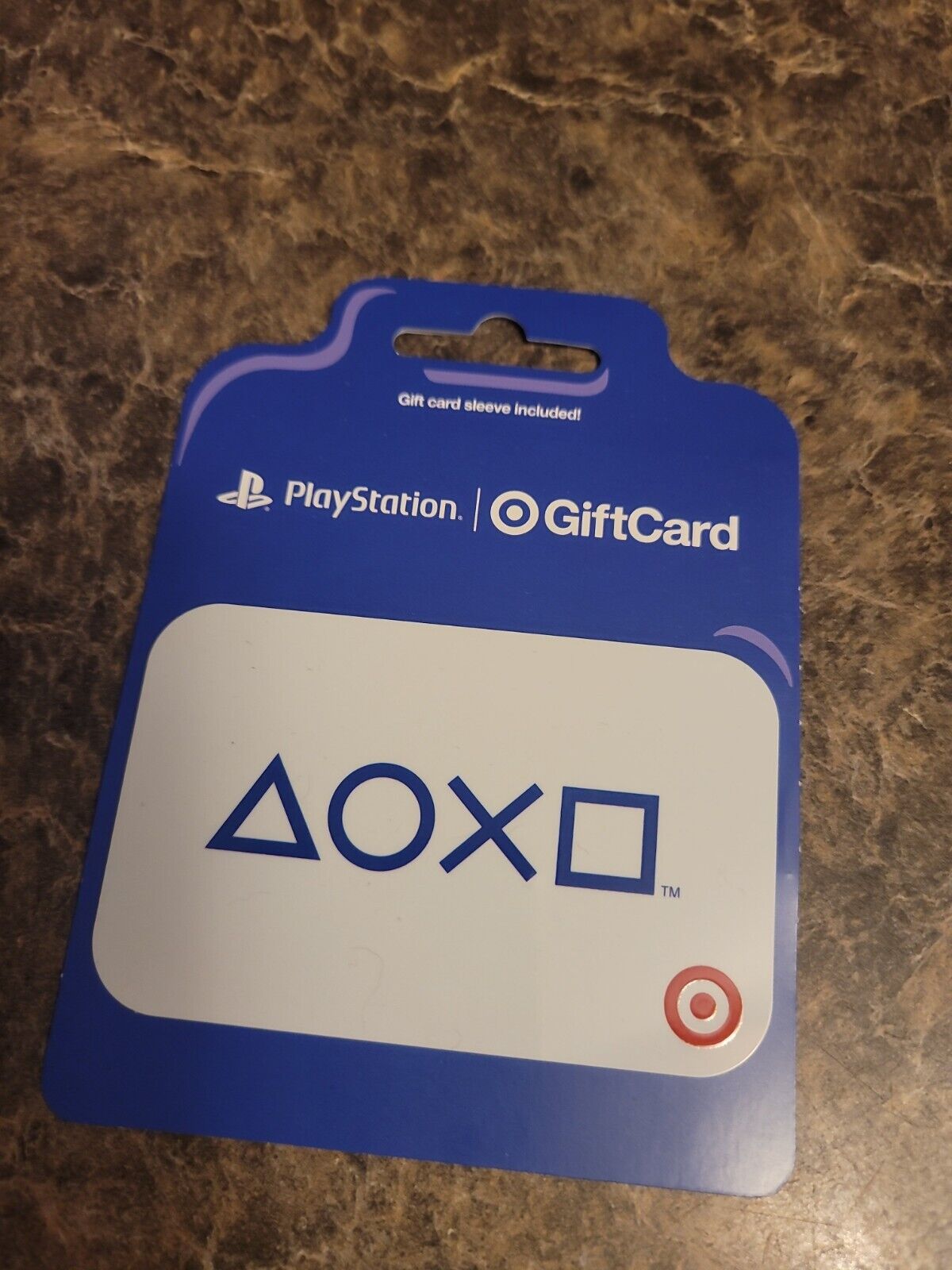 Target gift card shaped like a PlayStation controller. Gift card