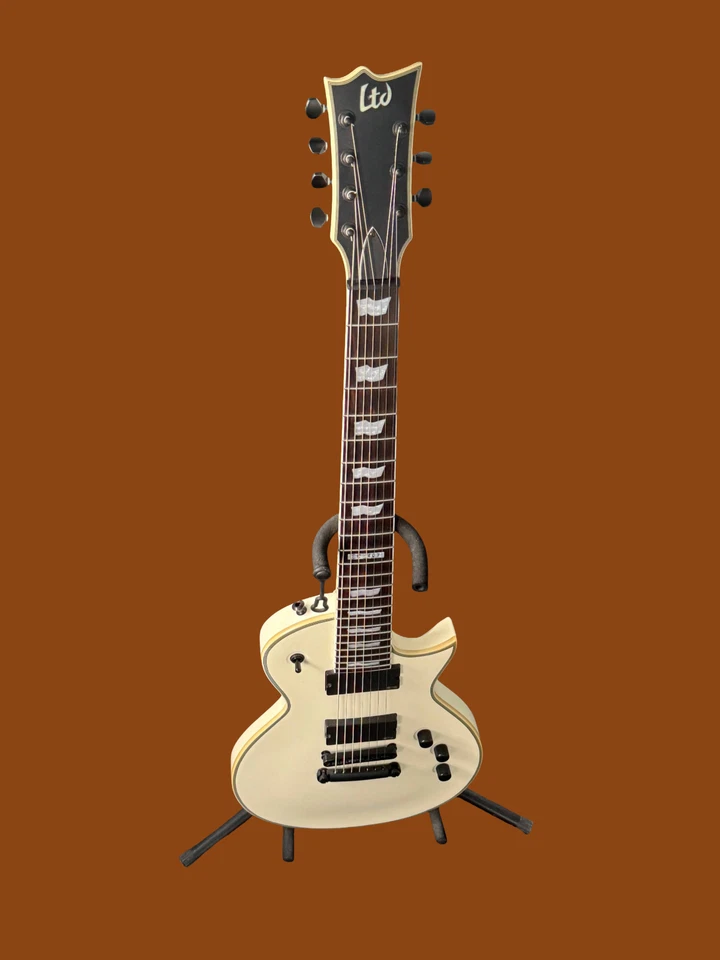 Guitarra de 7 cuerdas ESP LTD EC-407 rara blanca olímpica con encuadernación + estuche y soporte Foto 2 de 4