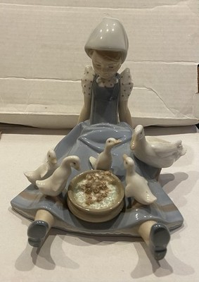 Lladro, My Hungry Brood Girl Feeding Ducks #5074. In original Box