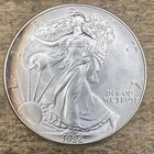 BEAUTIFULLY RIM TONED 1986 .999 Fine Silver American Eagle Coin - 1 oz / ozt