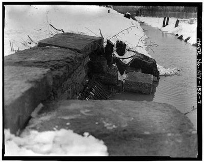 #ad 7. VIEW OF WING WALL ON EAST SIDE OF OOTHOUT CULVERT #11 LOOKING NORTH UP THE $12.99