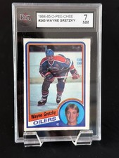 1984-85 OPC O-pee-chee NHL Hockey Card #243 Wayne Gretzky KSA 7 NM